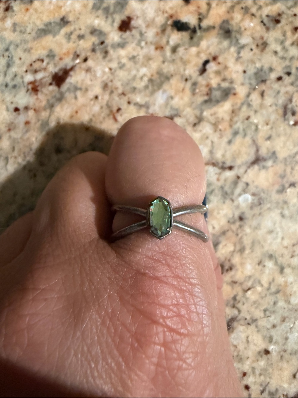 Kendra Scott Silver Split Ring with Light clear iridescent Oval Stone